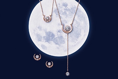 スタージュエリーのクリスマス限定ネックレス＆ピアス - 太陽と月の輝きをひとつに