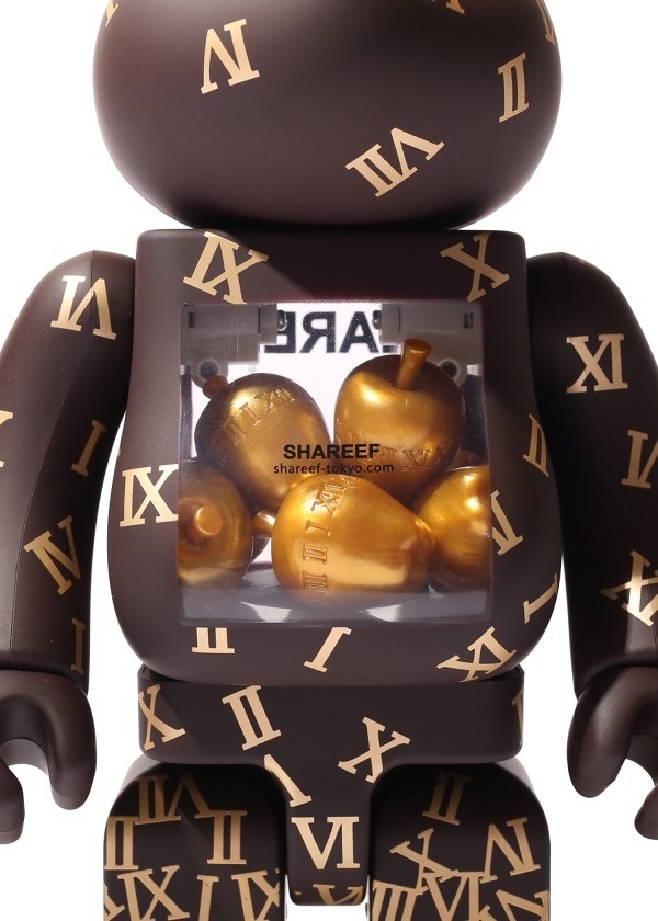 シャリーフの“チョコ色”「ベアブリック」ボディから透ける黄金リンゴ&降り積もるローマ数字もコピー シャリーフの“チョコ色”「ベアブリック」ボディから透ける黄金リンゴ&降り積もるローマ数字もコピー